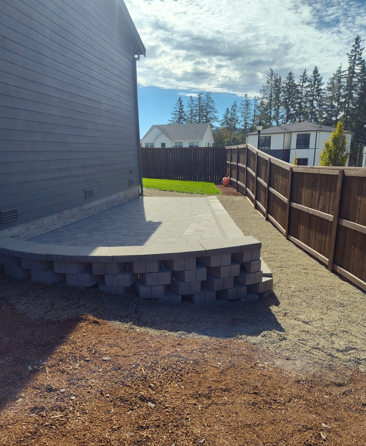 Raised paver platform and patio area